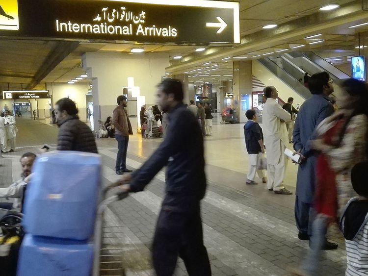 Returning Passengers at the Jinnah International Airport in Karachi